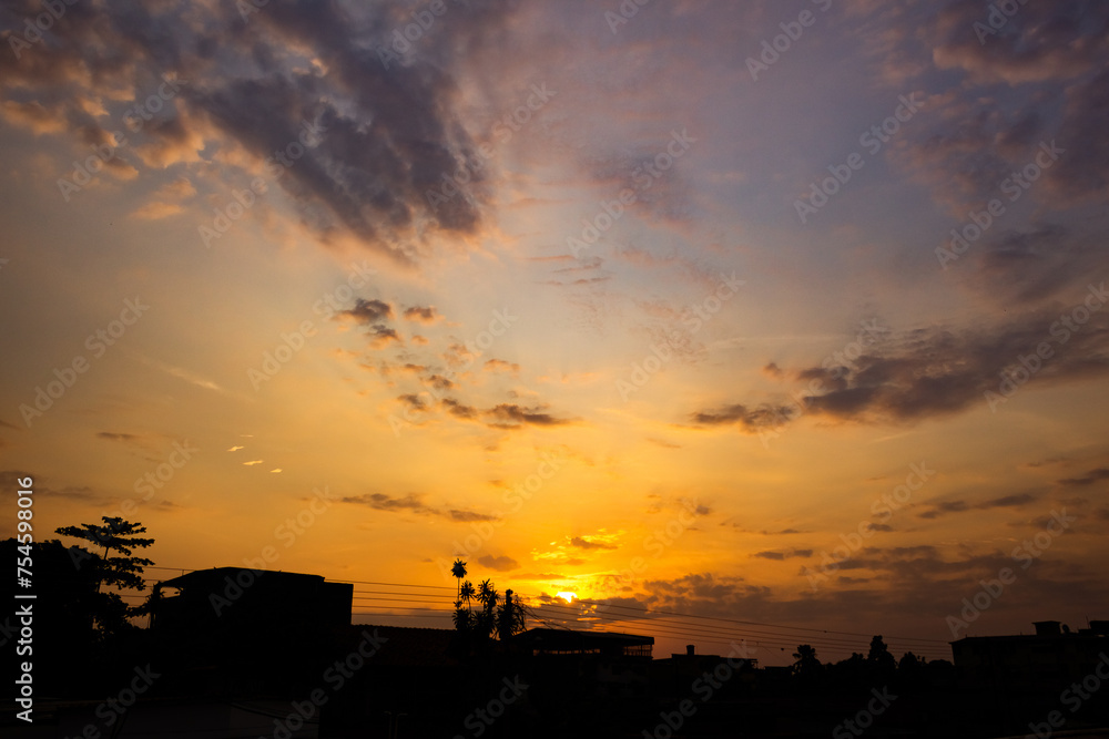 Beautiful sunset over the city. Silhouette of the city at sunset.