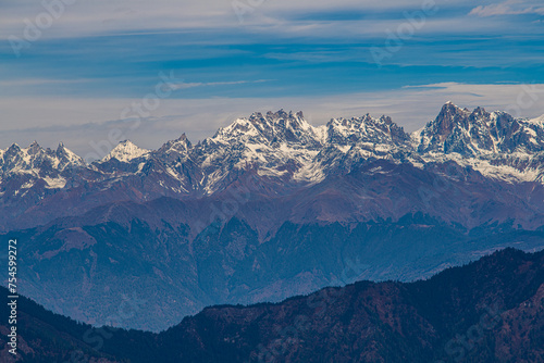 Jagged Peaks of the Himalayas Overlooking the Valleys from Murma Top, Nepal