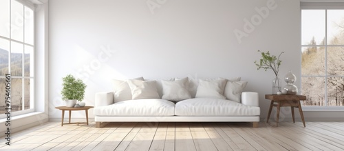 A white couch sits in a modern living room, positioned beside a large window that lets natural light in. The room features a minimalistic Nordic interior with a wooden floor and white decor.