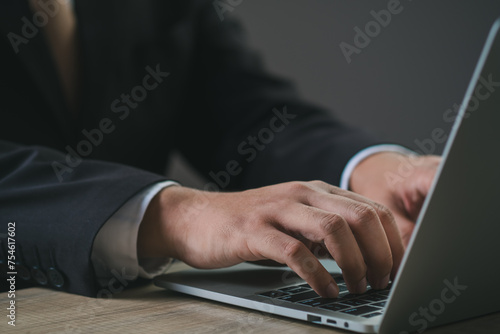 Businessman's hands are finger point to Searching for information. Using laptop with your website. Data Search Technology Search Engine Optimization. Online business search a job for work. © Bordinthorn