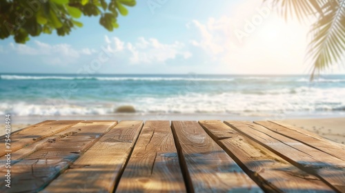 Wooden table top with copy space. Beach background © Jane Kelly