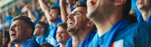 Italian football soccer fans in a stadium supporting the national team, Squadra Azzurra
 photo