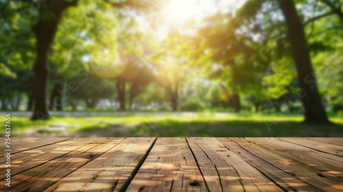 Wooden table top with copy space. Park background