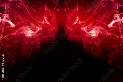 Red smoke motion on black background.