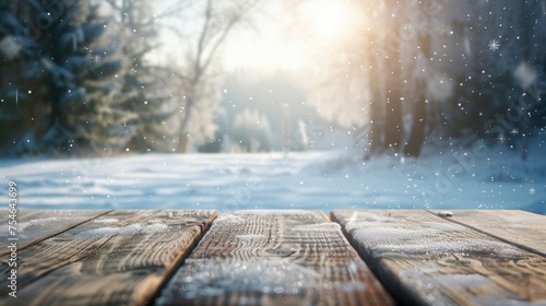 Wooden table top with copy space. Snowy landscape background