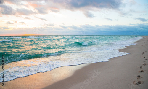 Amazing sunrise horizon  soft sky  turquoise sea waves