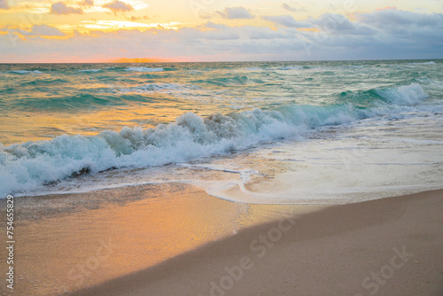 Beautiful clouds over the sea, sunrise shot. Sunset in the ocean. Sunset on a tropical beach.