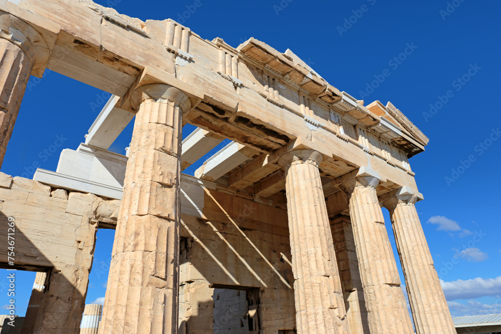 Up view to The Propylaea columns, the monumental gateway that serves as the entrance to the Acropolis.