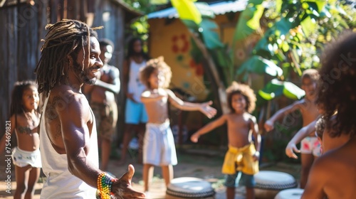 An Afro-Brazilian capoeira instructor is teaching kids dynamic movement, fostering cultural exchange in an outdoor setting.
