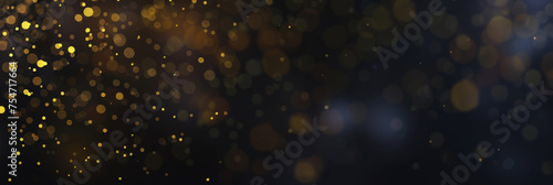 gold and blue bokeh glitter lights abstract Background particle defocused.Sparkling on dark background..Background bokeh blur circle variety blue gold. Dreamy soft focus wallpaper backdrop