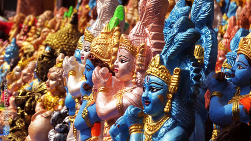 Colorful mythological sculptures displayed in a shop