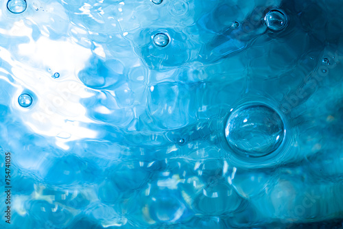 Water bubbles abstract bokeh light in the pool