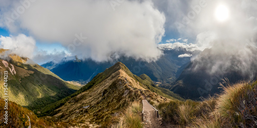 Kepler Track Panorama: Landscape with Mountains and tussock in Fiordland National Park, New Zealand photo