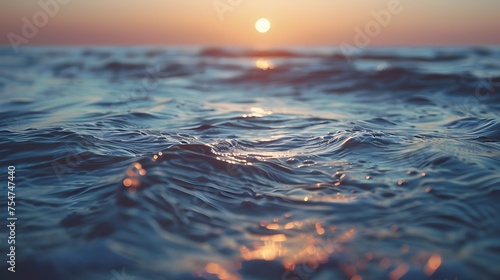 Sunset Ocean Water with Warm Hues and Gentle Waves during Golden Hour photo