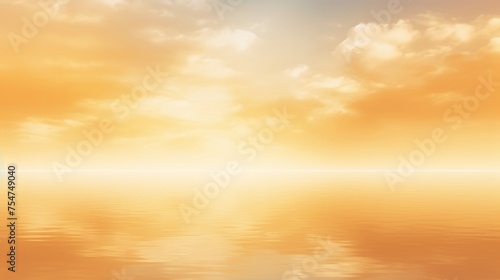 A golden sky at dawn serves as an abstract background, evoking a sense of tranquility and serenity with its warm hues.
