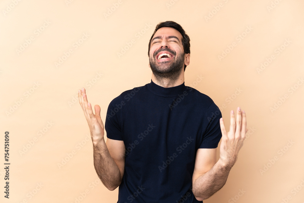 Caucasian handsome man over isolated background smiling a lot Caucasian handsome man over isolated background smiling a lot