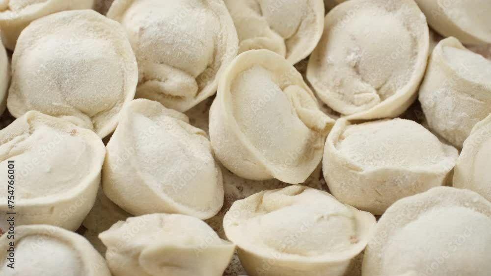 Zoom frame traditional dumplings with meat before cooking Zoom frame traditional dumplings with meat before cooking