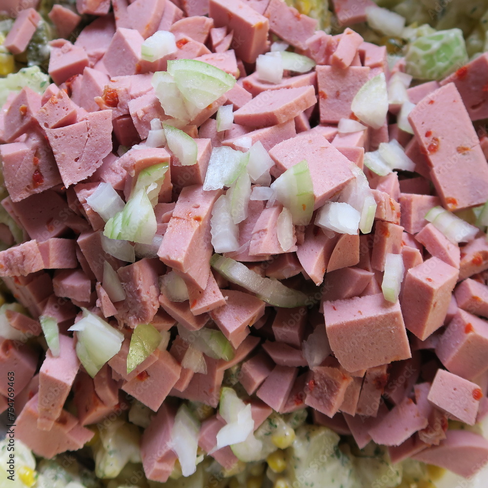 chopped sausage, with cucumbers and onions for the sausage salad chopped sausage, with cucumbers and onions for the sausage salad