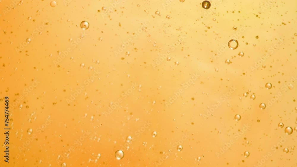 Abstract yellow colorful background with oil on water surface. Oil drops in water abstract psychedelic, abstract image. Abstract yellow colorful background with oil on water surface. Oil drops in water abstract psychedelic, abstract image.