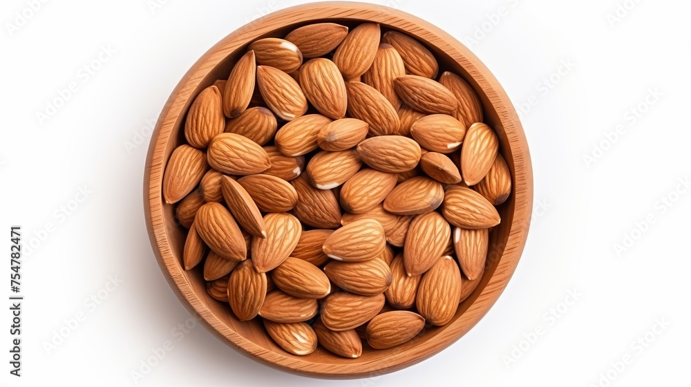 A close-up of raw brown almond seeds in a wooden bowl is isolated on a white background, offering a top-down view in a flat lay arrangement. A close-up of raw brown almond seeds in a wooden bowl is isolated on a white background, offering a top-down view in a flat lay arrangement.