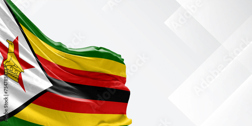 Zimbabwe national flag cloth fabric waving on beautiful white Background. photo