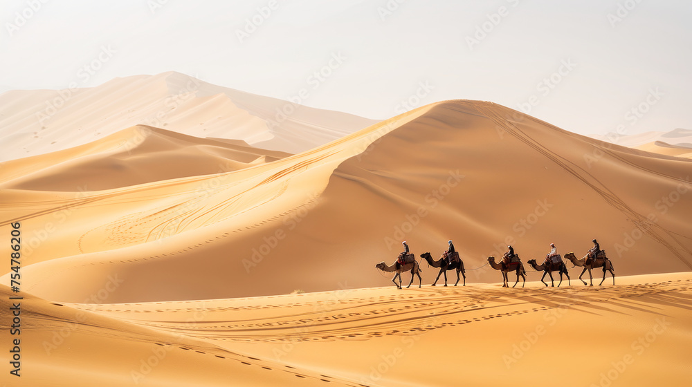 A camel caravan in the desert A camel caravan in the desert