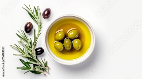 A top view displays a sauceboat with olive oil and fresh green olives, isolated on a white background.