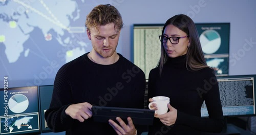 Focused professional cyber security team working to prevent security threats, find vulnerability and solve incidents