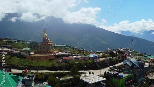 Giant buddha statue with bright blue sky at evening in tawang arunachal pradesh india.