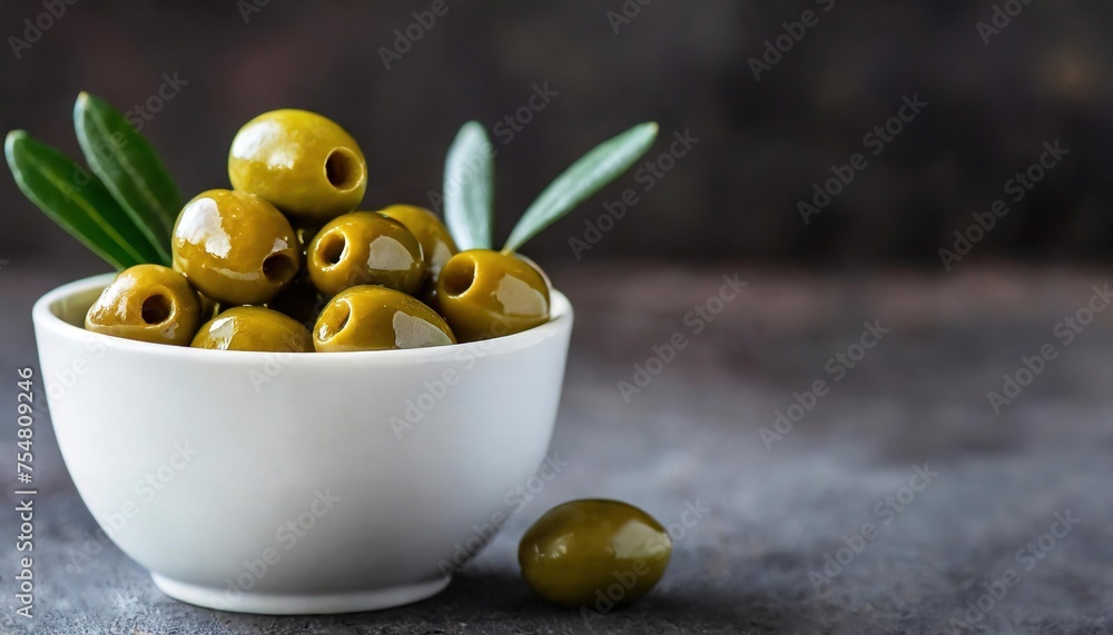 Olive with oil on a Dark background Olive with oil on a Dark background