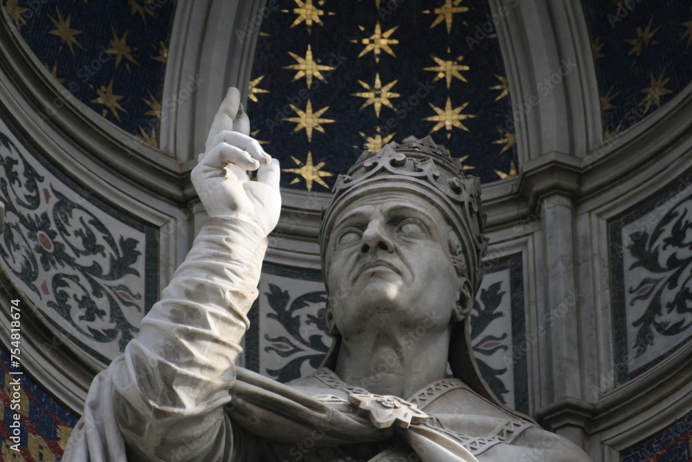 Facade of Florence Cathedral (Italian: Duomo di Firenze). Detail of a statue