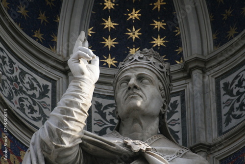 Facade of Florence Cathedral (Italian: Duomo di Firenze). Detail of a statue