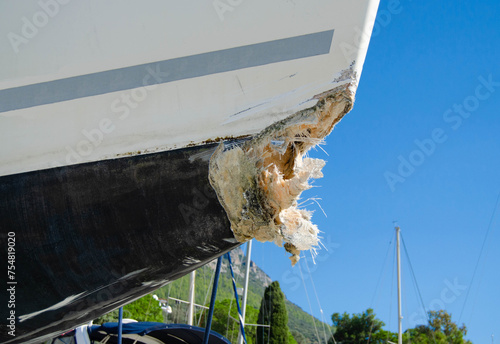 The bow of the yacht damaged by a collision with rocks