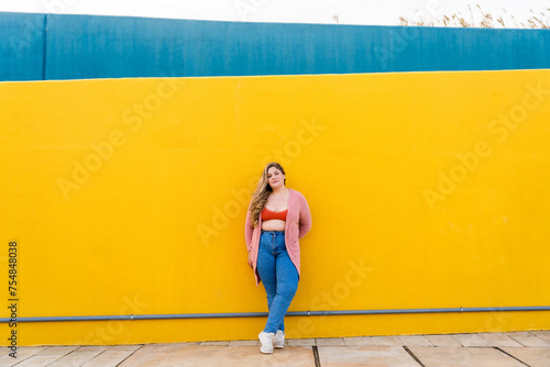 Beautiful plus size young woman outdoors - Confident chubby oversize female model strolling in the city, concepts about diversity, body acceptance and body positive