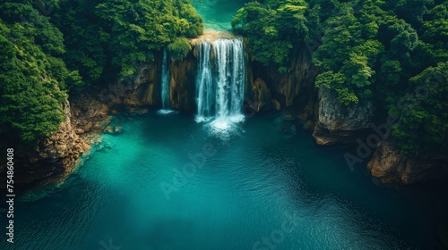 An awe-inspiring aerial view of an ancient rainforest with a hidden waterfall cascading into a crystal-clear lagoon  untouched by civilization. The majestic beauty of the natural world in its purest f