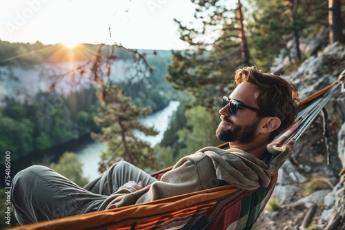 Man Relaxing on Hammock amidst Natural Scenery - Man, Hammock, Nature, Relaxation, Serenity, Outdoor, Leisure