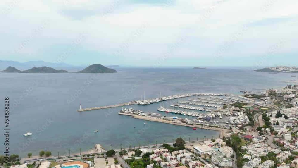 the wharf, bodrum , city ,Lighthouse, bodrum Türkiye, bodrum city, turkye ,Ship, Boat,Two ships in the water,reels,story the wharf, bodrum , city ,Lighthouse, bodrum Türkiye, bodrum city, turkye ,Ship, Boat,Two ships in the water,reels,story