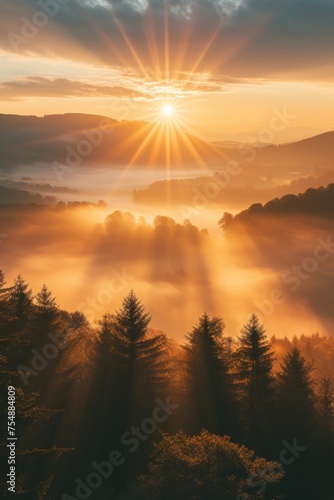 Golden Sunrise Rays Through Misty Hills