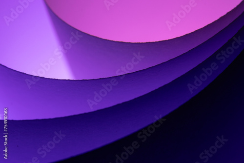 When I roll paper into many circles, I create a background with a sheet of paper and lights made up of different colors.