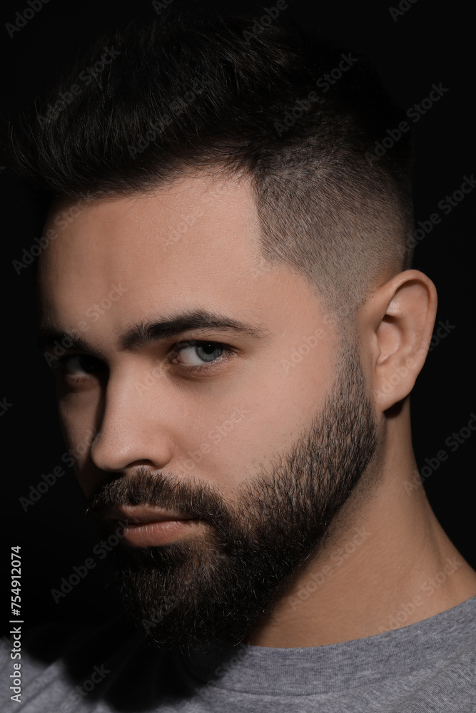 Obraz premium Evil eye. Man with scary eyes on black background