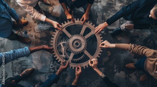 Office workers holding cog wheel as unity and teamwork in corporate workplace concept. Diverse colleague business people showing symbol of visionary system and mechanism for business