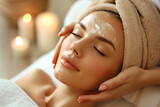 top down view of a woman getting a European facial massage in a beautiful luxurious day spa