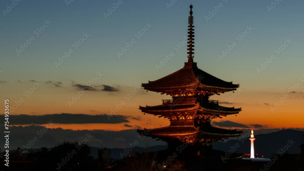 timelapse kyoto city aerial skyline view to ancient Yasaka pagoda building and Kyoto Tower at the back in higashiyama, Kyoto old town with sunset sky timelapse kyoto city aerial skyline view to ancient Yasaka pagoda building and Kyoto Tower at the back in higashiyama, Kyoto old town with sunset sky