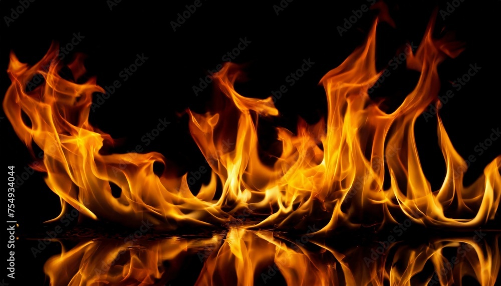 fire background - beautiful flame lights with reflection on a black background close-up fire background - beautiful flame lights with reflection on a black background close-up