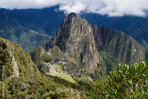 A panoramic view of the very famous Machu Picchu, the 15 th century Inca citadel located in the Andes of Peru, above the Urubamba River valley, designated a UNESCO World Heritage Site in 1983