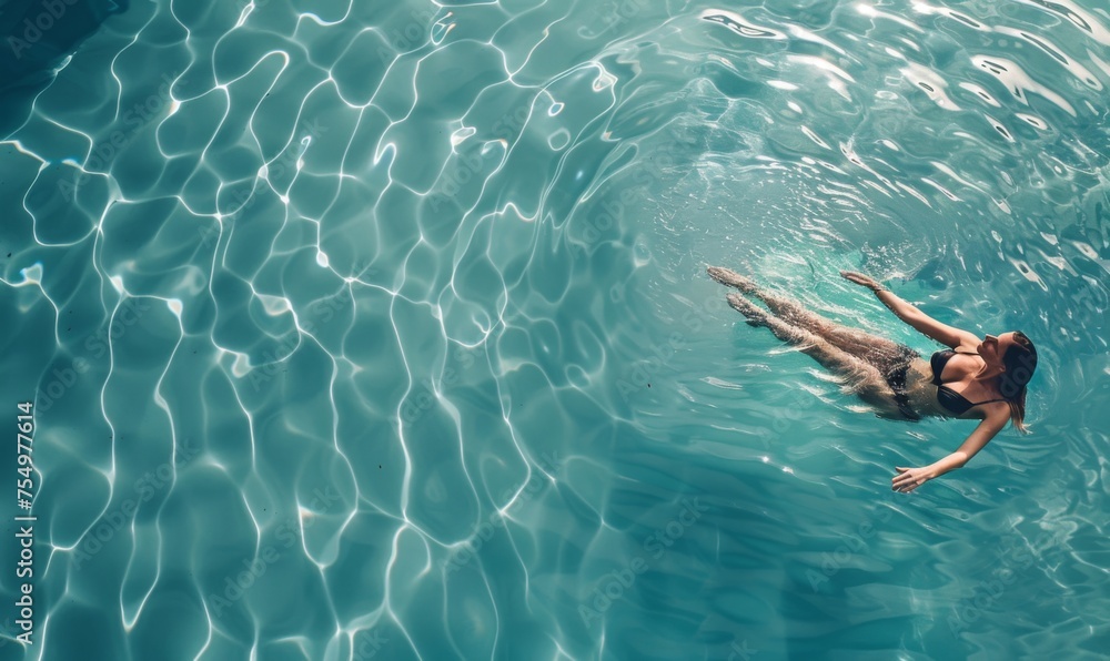 Women plunge into the pool with their eyes closed in satisfaction