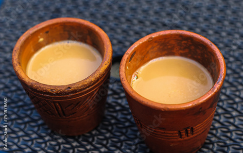 Two Kullad(Cup of Soil Clay) Tea. Soil cup Indian famous tea cup knows as kulhad. Milk tea in soil cup. photo