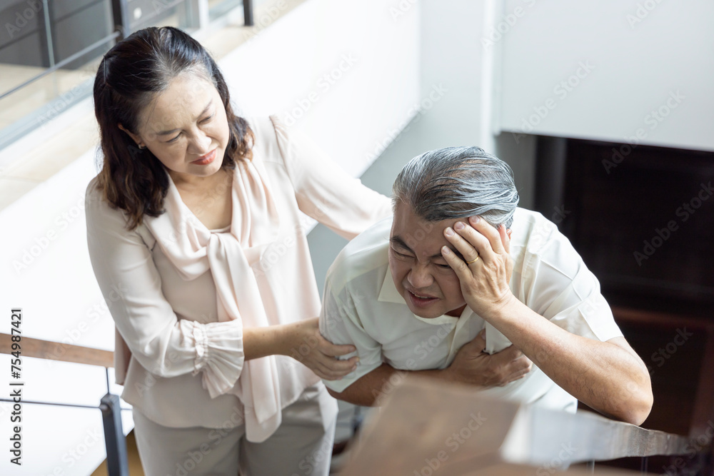 Fototapeta premium Asian Senior Couple Dealing with stroke, headache, stress, dementia concept; senior couple, husband and wife staying together with support and care