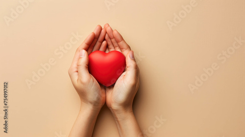 Conceptual image  hands of a woman cradle red heart on chic beige background. AI generative.