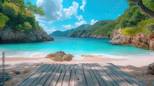 a wooden dock sitting on top of a sandy beach next to a body of water with mountains in the background. photo